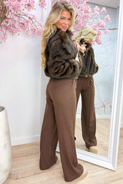 Wrapped in fluffy jacket - Bruin