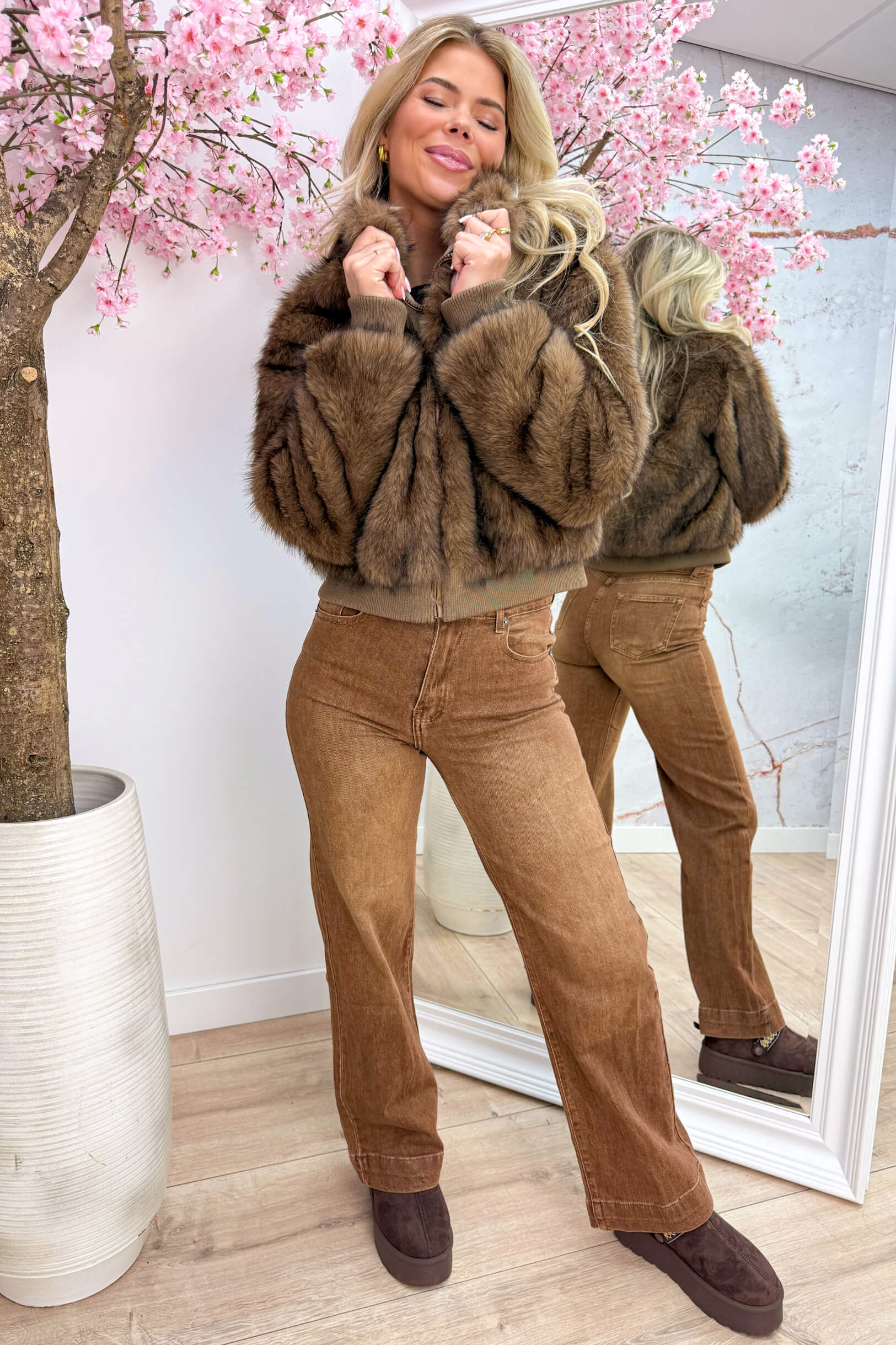 Wrapped in fluffy jacket - Camel