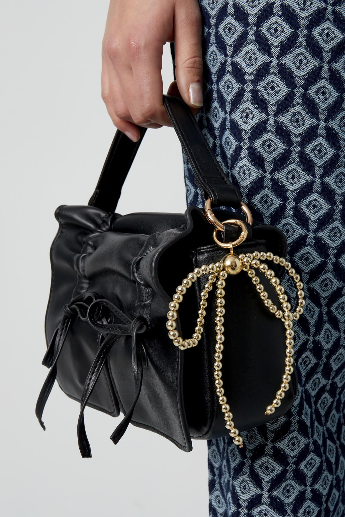 Beaded bow bag charm - Goud