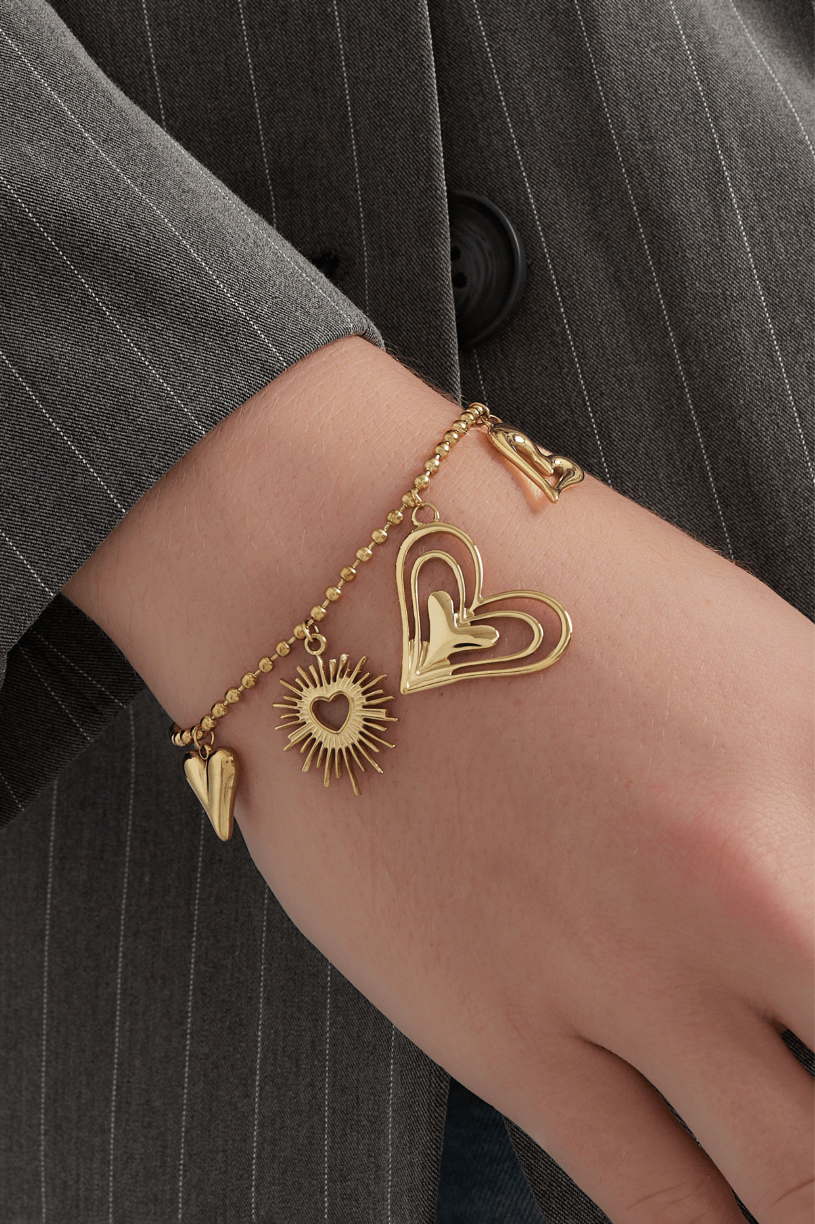 Loving hearts armband - Goud