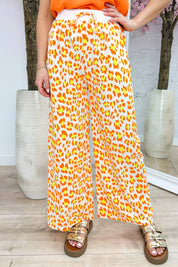 Multi color leopard flowy pants - Oranje