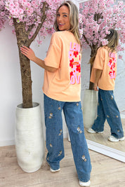 Lead with love oversized T-shirt - Oranje