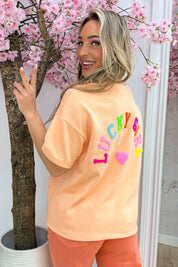 Lucky girl T-shirt - Lt. oranje