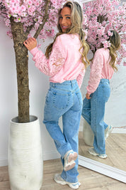 Wrapped in magic trui - Lollypop roze